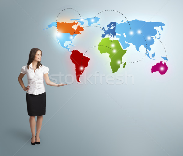 Young woman presenting colorful world map Stock photo © ra2studio