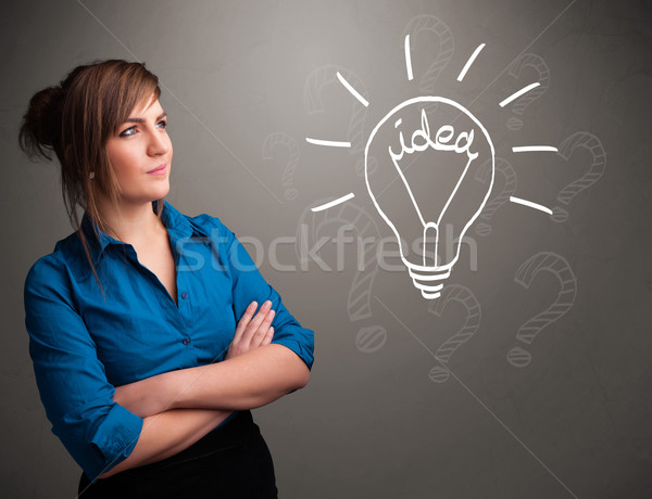 Jong meisje omhoog licht idee teken mooie Stockfoto © ra2studio