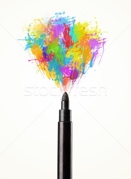 Felt pen close-up with colored paint splashes Stock photo © ra2studio
