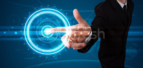 Businessman pressing high tech type of modern buttons  Stock photo © ra2studio