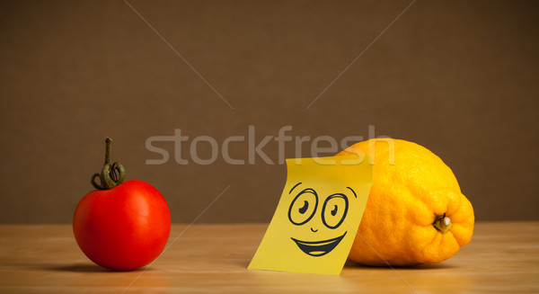 Lemon with post-it note watching at tomato Stock photo © ra2studio