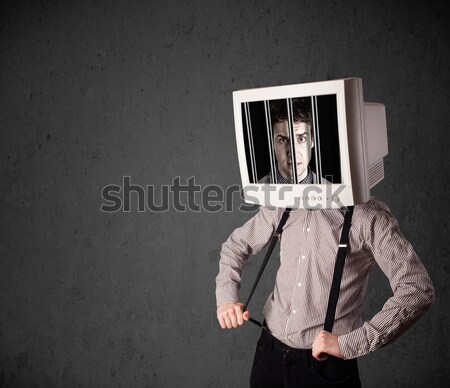 Business man with monitor on his head traped into a digital syst Stock photo © ra2studio