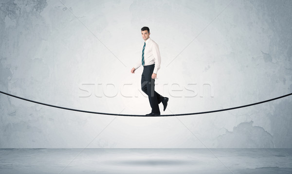 Umsatz guy Balancing fest Seil Geschäftsmann Stock foto © ra2studio