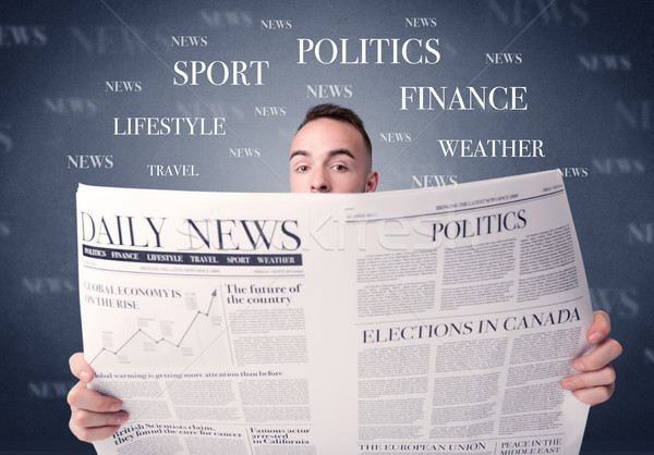 Businessman reading newspaper Stock photo © ra2studio