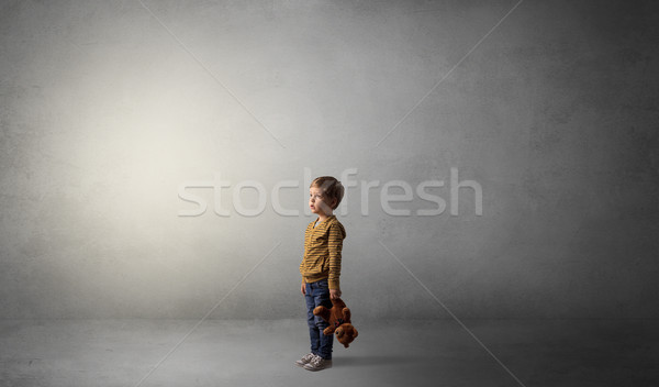 Little waggish kid in an empty room Stock photo © ra2studio