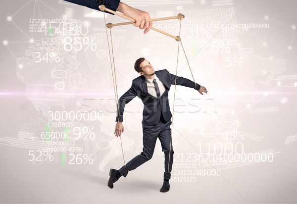 Subordinated puppet man with financial concept Stock photo © ra2studio