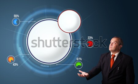 funny businessman in suit presenting abstract modern pie chart Stock photo © ra2studio