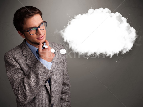 Good-looking young man thinking about cloud speech or thought bubble Stock photo © ra2studio