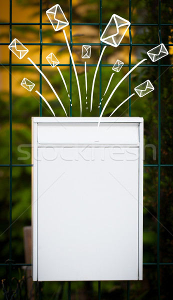 Hand drawn envelopes comming out of a mailbox Stock photo © ra2studio
