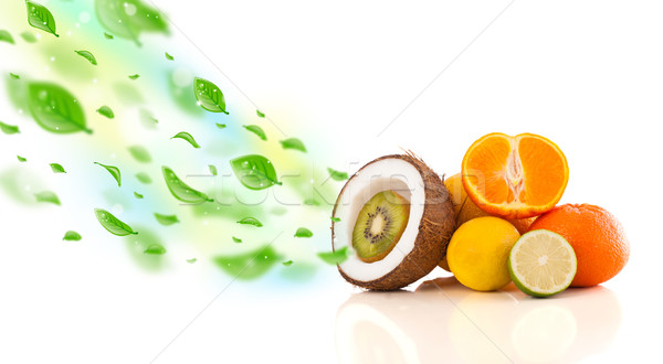Colorful fruits with green organic leafs Stock photo © ra2studio