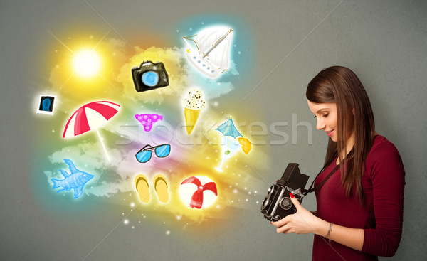 Teenage photographer making photos of holiday painted icons Stock photo © ra2studio