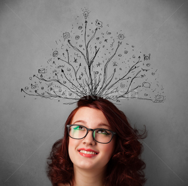 Stock photo: Young woman with tangled lines coming out of her head