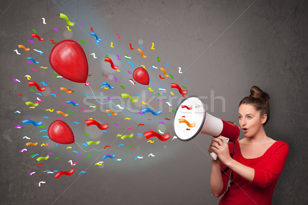 Foto stock: Jovem · megafone · balões · confete