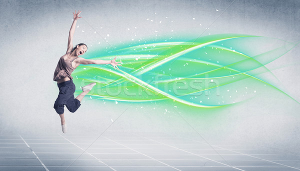 Hip hop dancer posing with green lines Stock photo © ra2studio