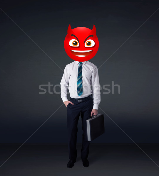 businessman wears devil smiley face Stock photo © ra2studio