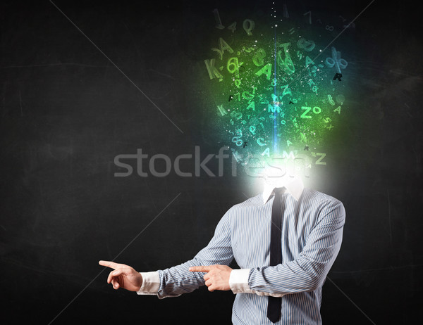 Business man with abstract glowing letters on head Stock photo © ra2studio