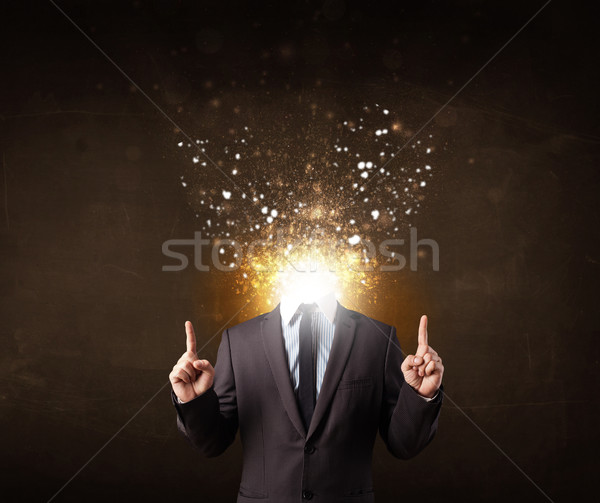 Business man with glowing exploding head Stock photo © ra2studio