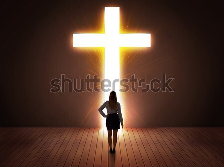 женщину глядя ярко крест знак семьи Сток-фото © ra2studio
