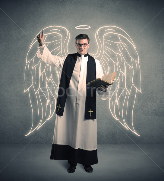 Jóvenes sacerdote bendición masculina grande Foto stock © ra2studio