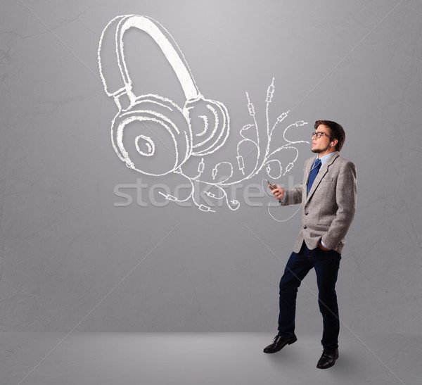 Foto stock: Atractivo · hombre · cantando · escuchar · música · resumen · auriculares