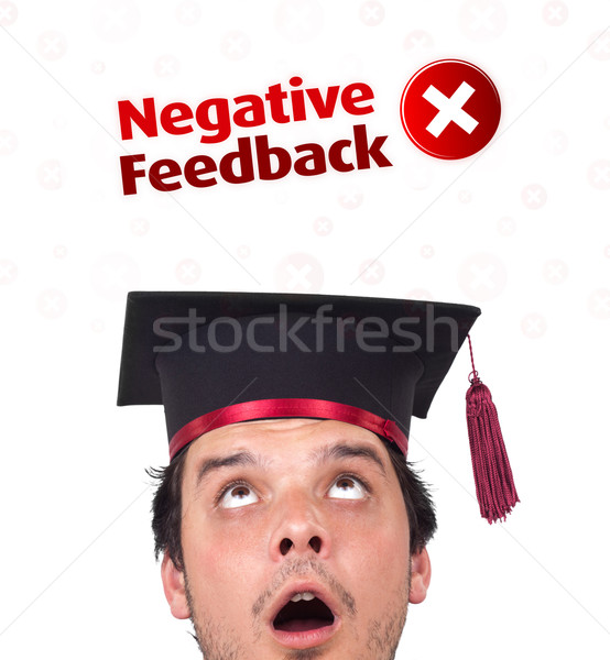 Young head looking at positive negative signs Stock photo © ra2studio