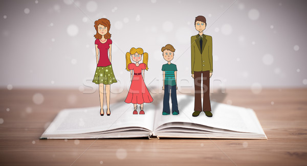 Drawing of a happy family on opened book Stock photo © ra2studio
