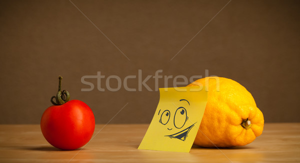 Lemon with post-it note looking curiously at tomato Stock photo © ra2studio