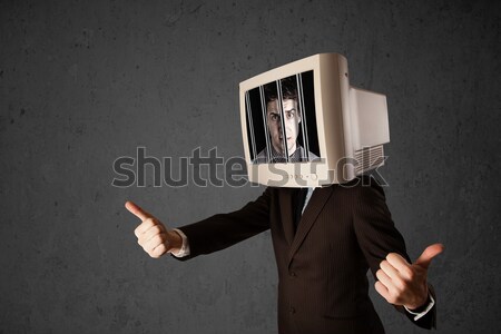 Business man with monitor on his head traped into a digital syst Stock photo © ra2studio