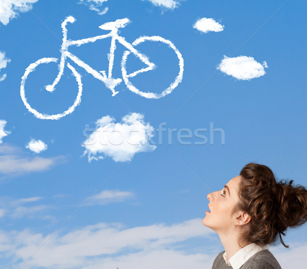 Fiatal lány néz bicikli felhők kék ég fiatal Stock fotó © ra2studio