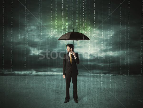 Business man standing with umbrella data protection concept Stock photo © ra2studio