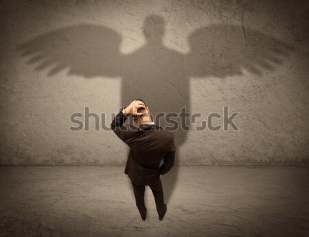 Tisztességes eladó angyal árnyék sikeres üzletember Stock fotó © ra2studio
