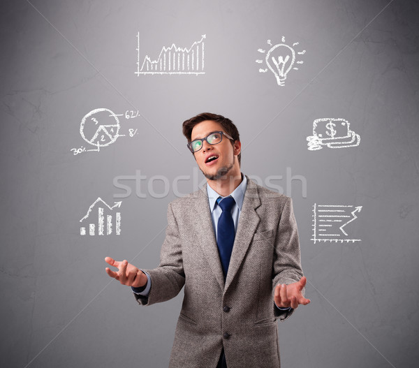 young boy juggling with statistics and graphs Stock photo © ra2studio