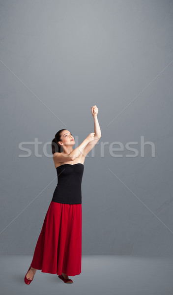 Pretty lady gesturing with copy space Stock photo © ra2studio