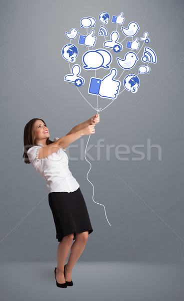 Hübsche Frau halten sozialen Symbol Ballon jungen Stock foto © ra2studio