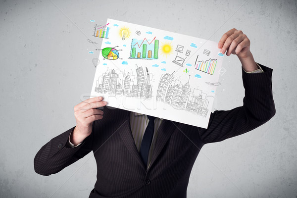 Businessman holding a paper with charts and cityscape in front o Stock photo © ra2studio