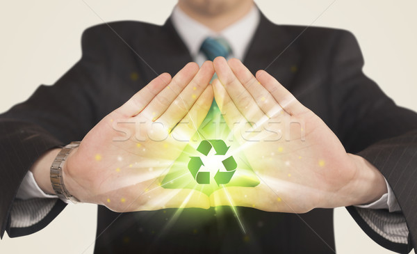 Hands creating a form with recycling sign Stock photo © ra2studio