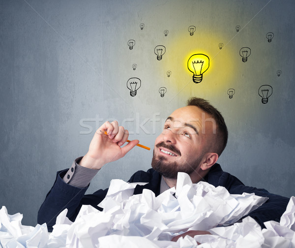 Businessman behind crumpled paper Stock photo © ra2studio