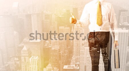 Business man looking at overlay city background Stock photo © ra2studio