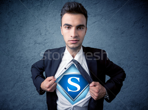 Businessman ripping off his shirt with superhero sign  Stock photo © ra2studio