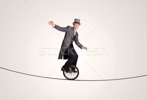 極端な ビジネスマン ライディング 一輪車 ロープ ビジネス ストックフォト © ra2studio