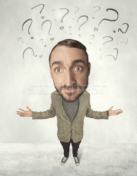 Big head person with question marks Stock photo © ra2studio