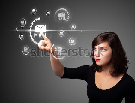 pretty woman looking social network icons in abstract cloud Stock photo © ra2studio