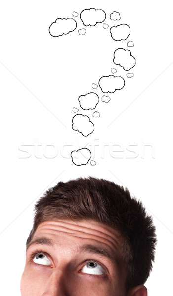 Caucasian male adult has way too many questions in his head  Stock photo © ra2studio