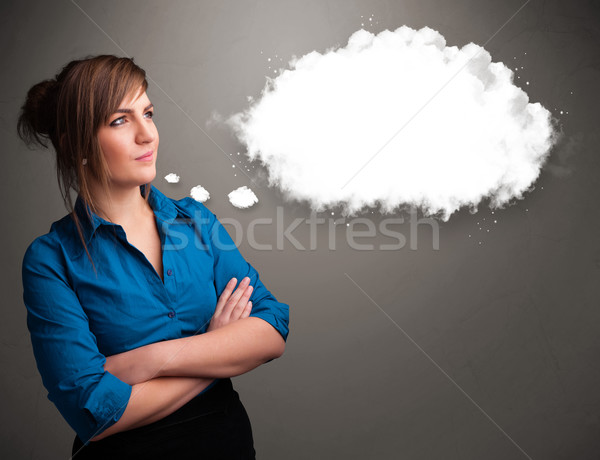 Csinos fiatal hölgy gondolkodik felhő beszéd Stock fotó © ra2studio