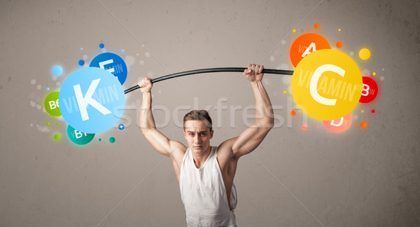 Imagine de stoc: Muscular · om · colorat · vitamina · greutăţi