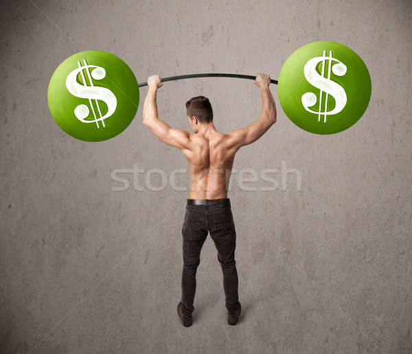 Muskuläre Mann Heben grünen Dollarzeichen Gewichte Stock foto © ra2studio