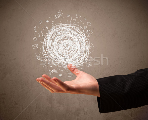 Chaos concept in the hand of a businessman Stock photo © ra2studio