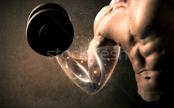 Bodybuilder lifting weight with energetic white lines concept Stock photo © ra2studio