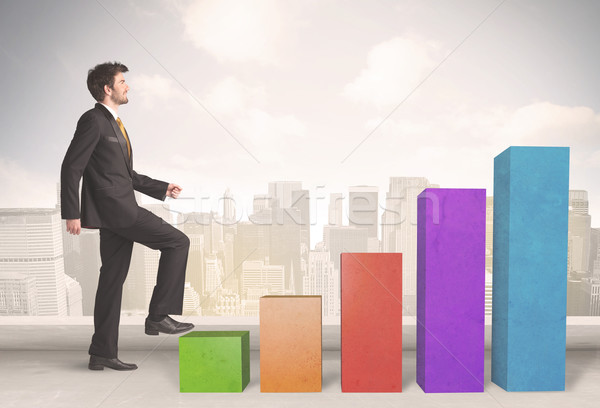 Business person climbing up on colourful chart pillars concept Stock photo © ra2studio