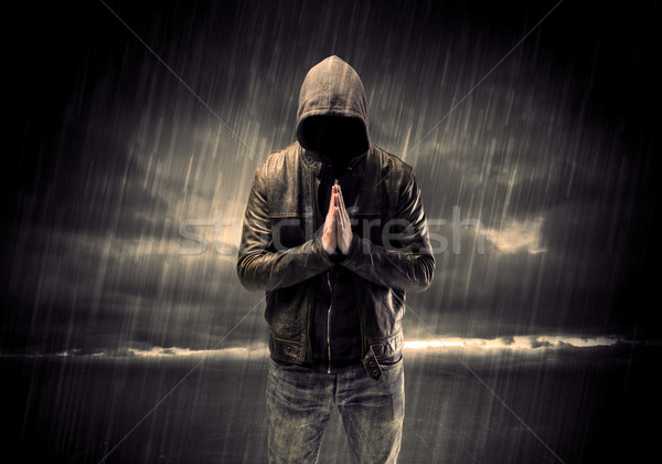 Anonymous terrorist in hoodie at night Stock photo © ra2studio